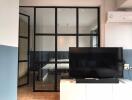 Modern living room with glass partition