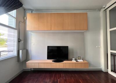 Modern living room with built-in TV cabinet