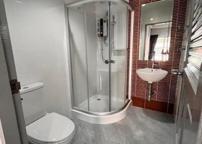 Modern bathroom with glass shower enclosure