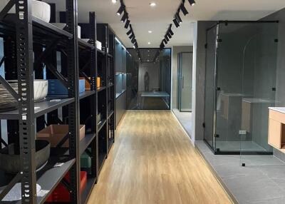 Modern storage room with shelving and wooden floor