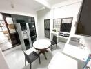 Modern kitchen with dining area and appliances