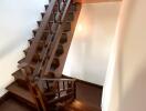 wooden staircase with dark finish