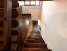 Wooden staircase with natural light