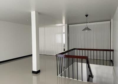 Open white space with black railing