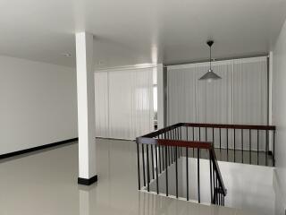 Open white space with black railing