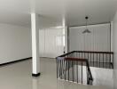 Open white space with black railing