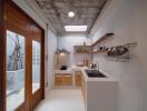 Modern kitchen with wooden accents and concrete ceiling