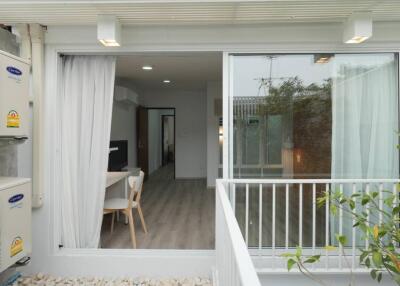 View into an apartment from a balcony