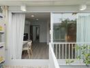 View into an apartment from a balcony