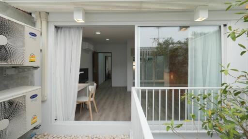 View into an apartment from a balcony