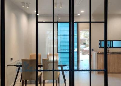 Modern dining area with large sliding glass doors