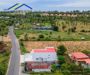 Aerial view of a building and its surrounding area