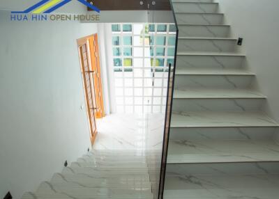 Modern staircase with marble steps