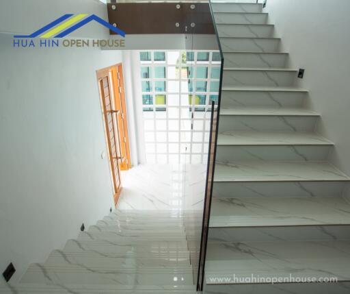 Modern staircase with marble steps