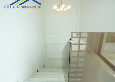 Interior staircase with glass railings