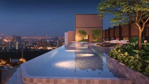 Rooftop infinity pool with city skyline view in the evening