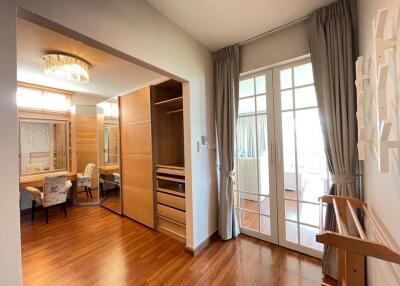 Bedroom with closets and a dressing area