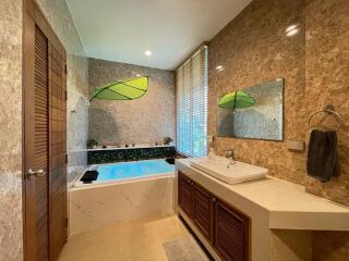 Modern bathroom with bathtub and sink