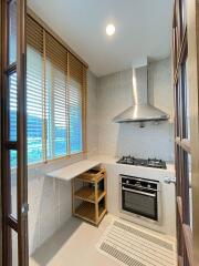 Kitchen with modern appliances and natural light