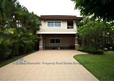 Front view of a two-story house with driveway