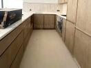 Modern kitchen with wooden cabinets and tiled backsplash