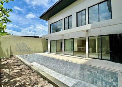 Modern house with an empty swimming pool