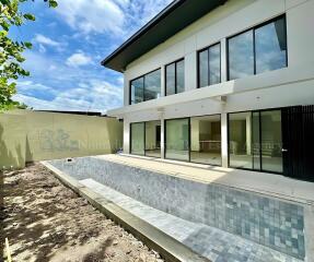 Modern house with an empty swimming pool