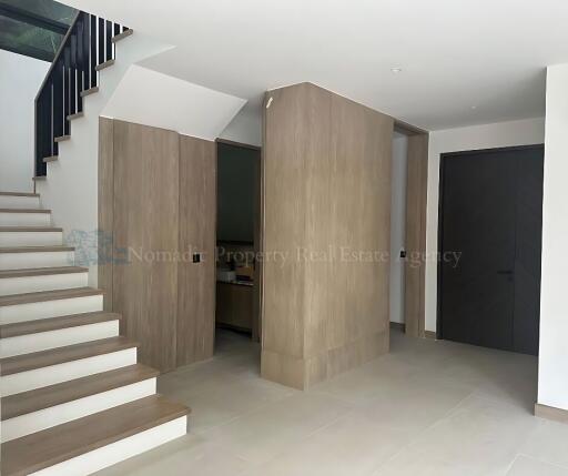 modern house entryway with stairs