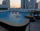 Rooftop swimming pool with city skyline view