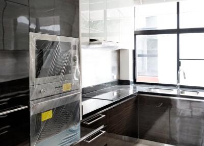 Modern kitchen with sleek black and white cabinetry