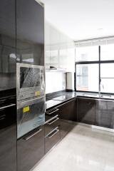 Modern kitchen with sleek black and white cabinetry