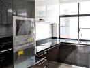 Modern kitchen with sleek black and white cabinetry