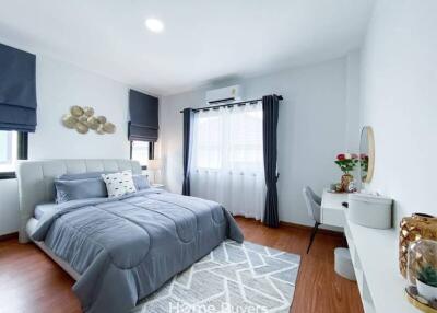 Cozy bedroom with grey and white decor