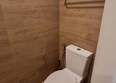 Modern bathroom with toilet and window