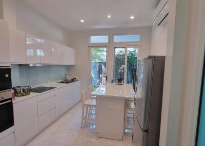 Modern kitchen with island and high-end appliances