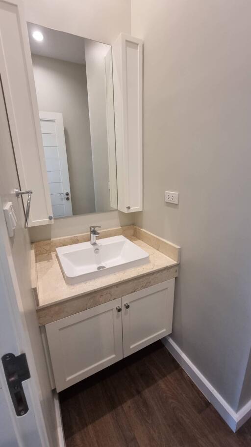 Modern bathroom with sink and cabinet