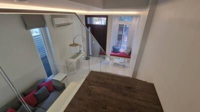 Living room with modern interior and mezzanine