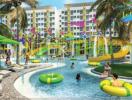 Colorful outdoor recreational pool area with people swimming and colorful water features