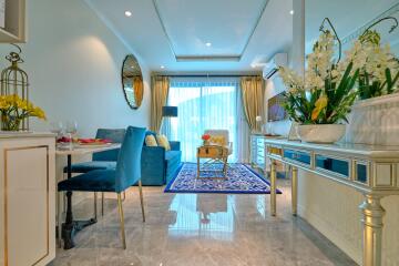 Stylish living room with blue sofa and large window