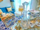 Cozy living room with blue sofa, glass table, and decorative items