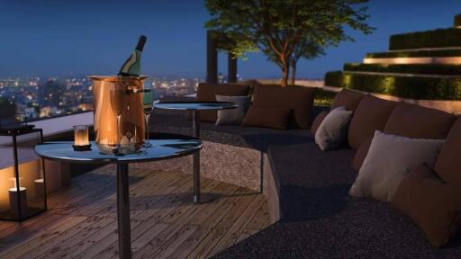 Outdoor terrace with seating area and city view