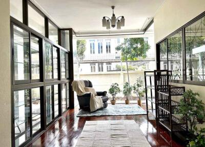 Bright and spacious sunroom with large windows