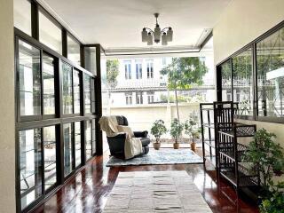 Bright and spacious sunroom with large windows