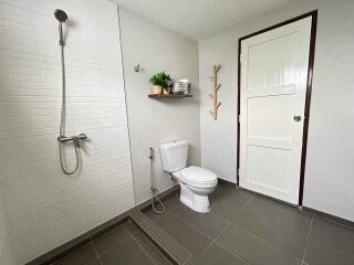 Modern bathroom with shower and toilet