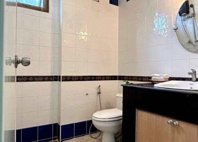 Modern bathroom with white and blue tiles