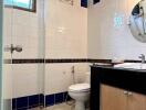 Modern bathroom with white and blue tiles