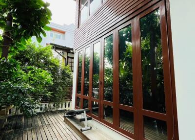 Exterior view of a building with wooden deck