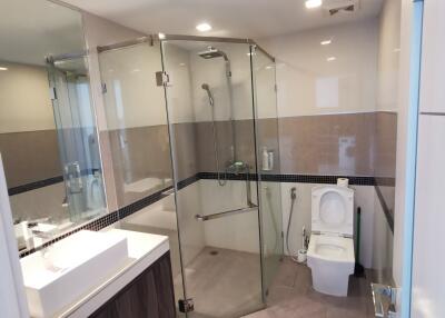 Modern bathroom with glass shower and vanity