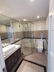 Modern bathroom with glass shower and vanity