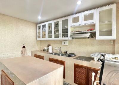 Modern kitchen with island and ample storage space